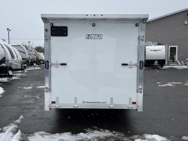 2024 e z hauler 7×24 aluminum 4 place drive in/out w/tapered ramps, rear canopy